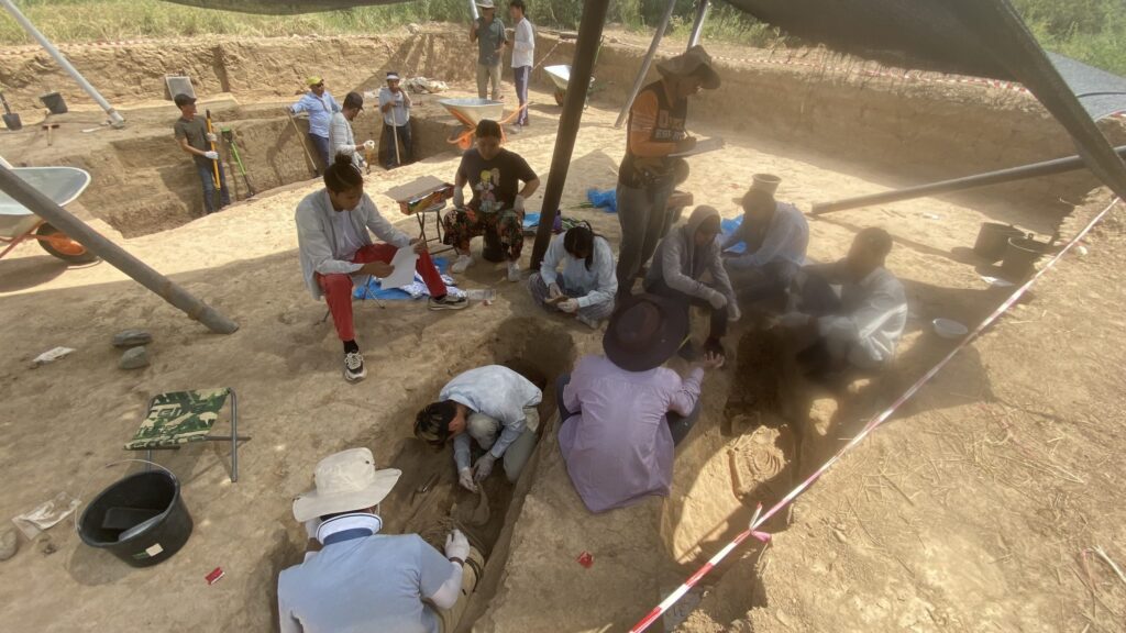 The team prepares human remains for DNA sampling.